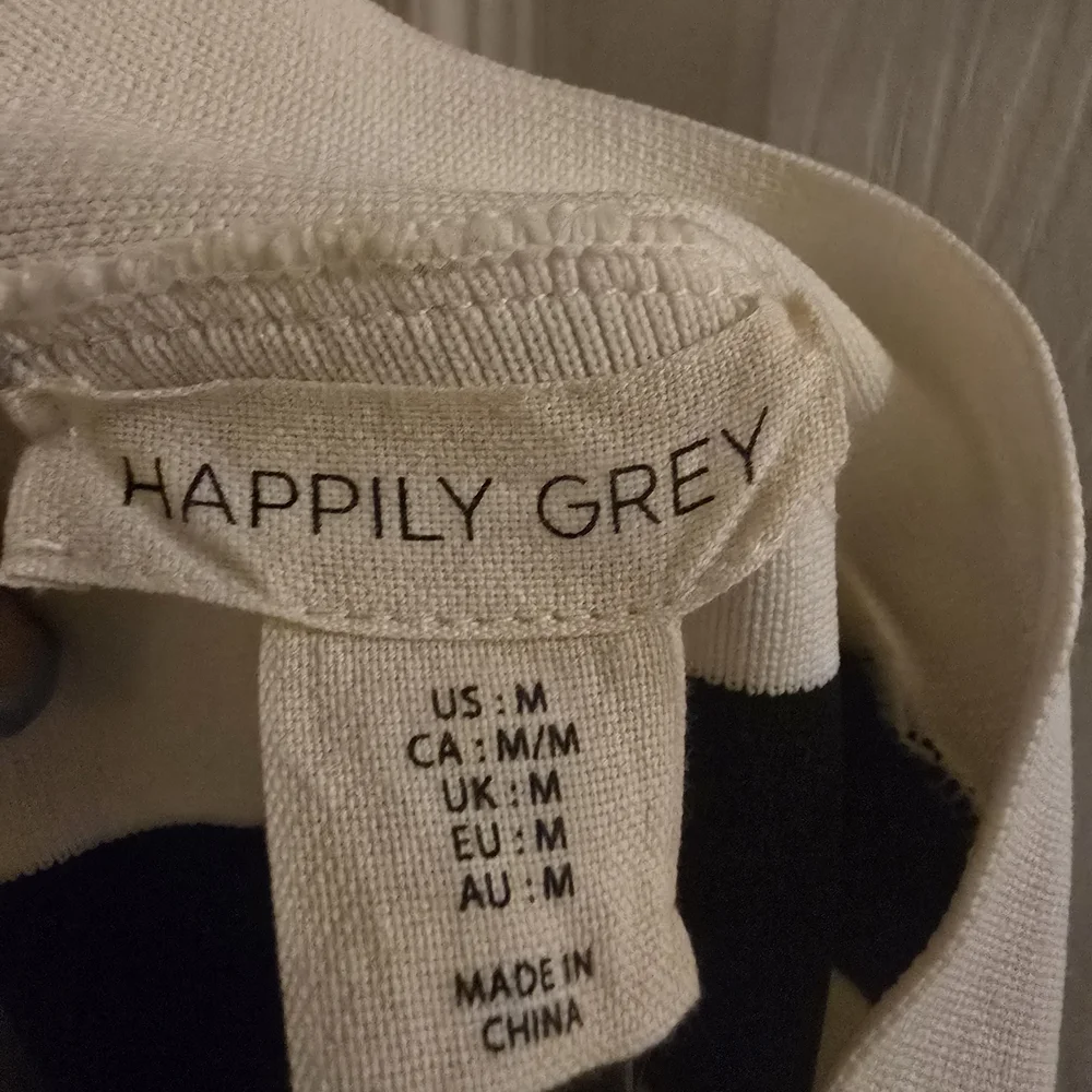 BNWT Striped Black and White Cross Strap Knit Mini Dress - Picture 10 of 13